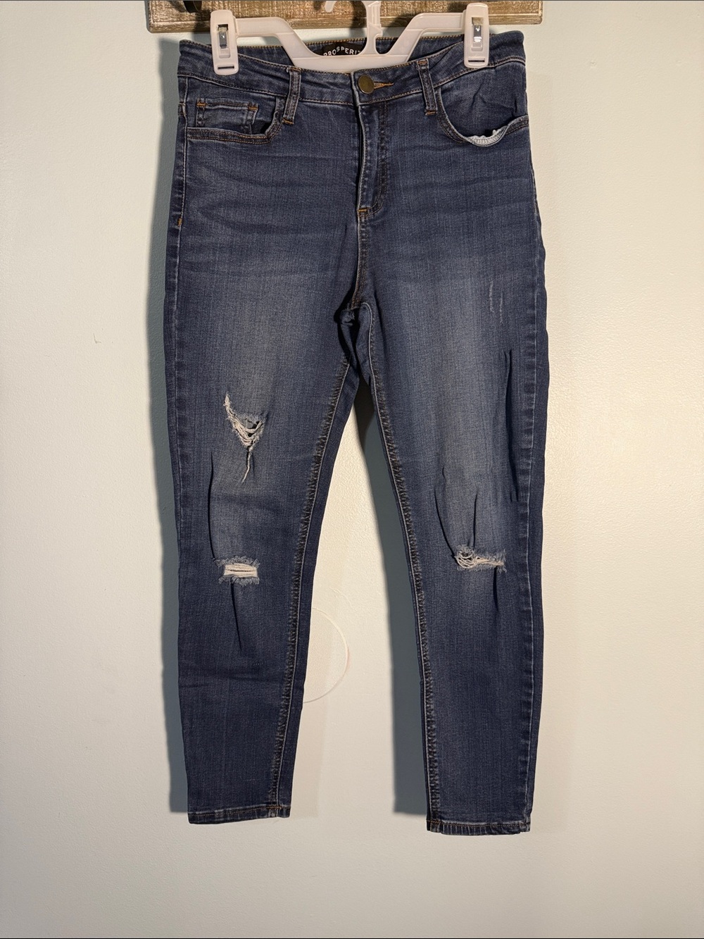 High-Rise Distressed Skinny Jeans in Dark Blue